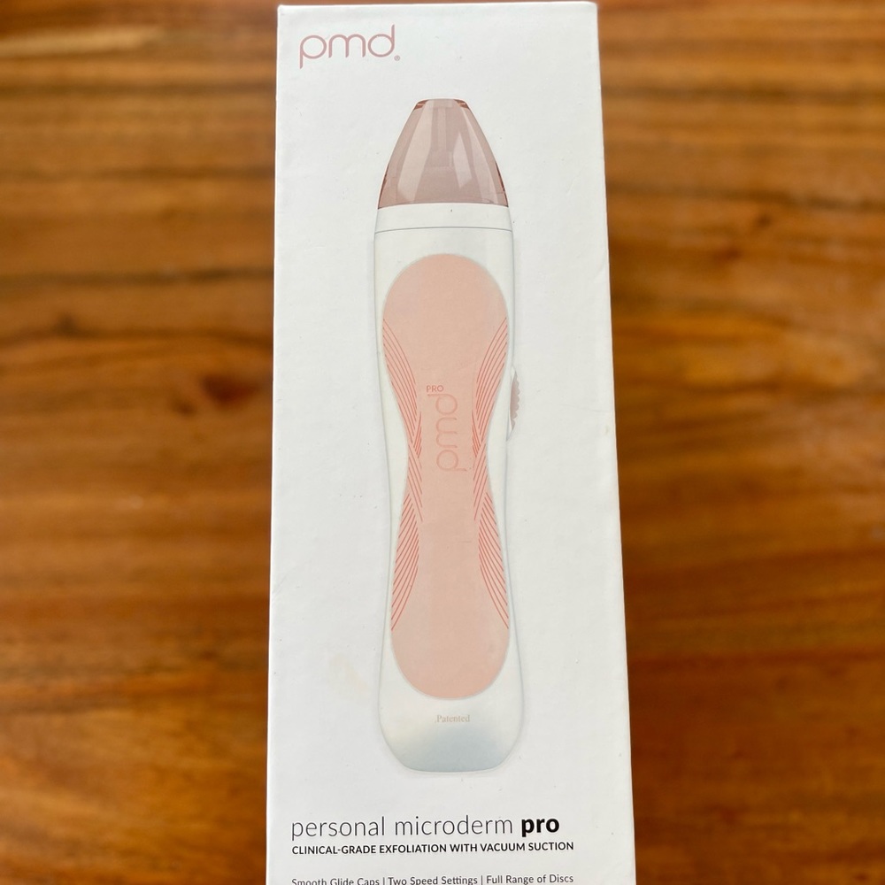 PMD-Personal microderm pro. Still sealed, box only opened for photos.